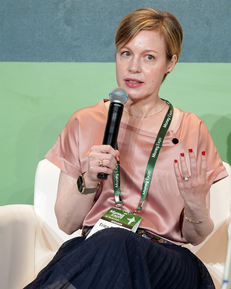 Erica Badocco, Founder and Principal of BLegal, speaking at an industry conference