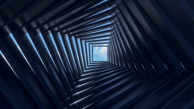 Dark blue geometric tunnel receding towards the light